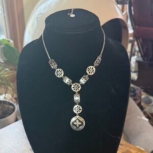 Elegant Silver Necklace with Floral Accents